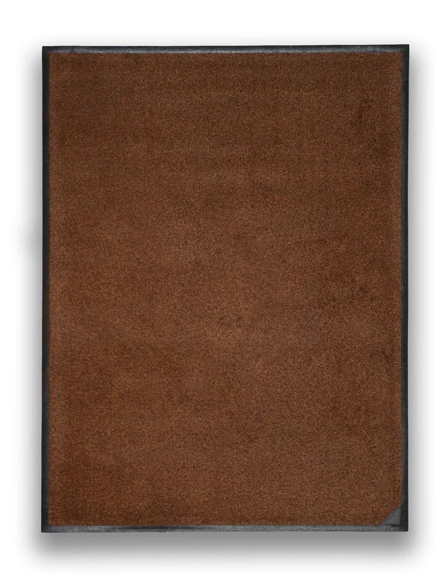 The same walk-off mat after remanufacturing, with a clean new border